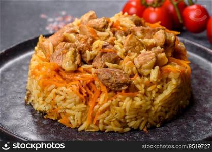 Pilaf or pilau with chicken, traditional uzbek hot dish of boiled rice, chicken meat, vegetables and spices on plate. Pilaf or pilau with chicken, traditional uzbek hot dish of boiled rice and chicken meat