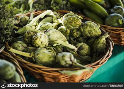 pile artichoke display farmers market. Resolution and high quality beautiful photo. pile artichoke display farmers market. High quality beautiful photo concept