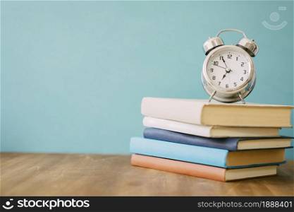 pile books clock . Resolution and high quality beautiful photo. pile books clock . High quality and resolution beautiful photo concept