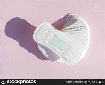 pile daily clean sanitary towels pink background . Resolution and high quality beautiful photo. pile daily clean sanitary towels pink background . High quality and resolution beautiful photo concept