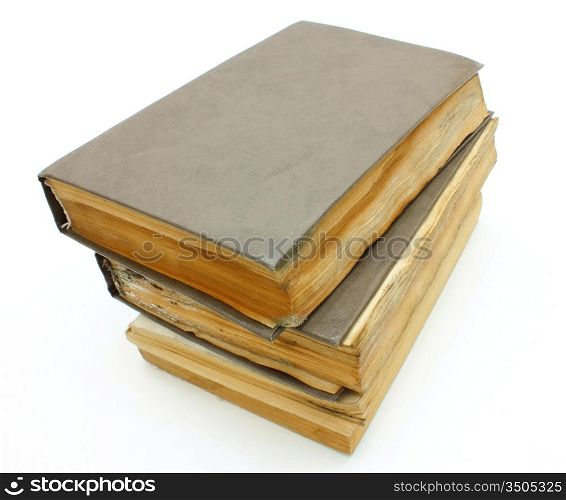 Pile from old mouldy books on a white background