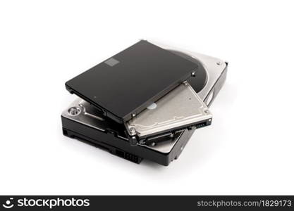 Pile of a variety of computer Hard disk drive HDD and SSD isolated on white background. Computer hardware data storage