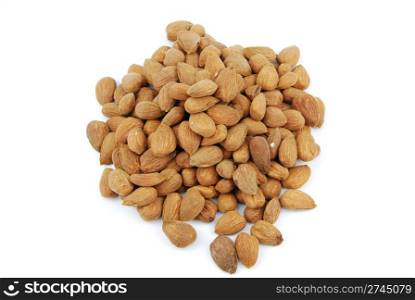 pile of almond nuts isolated on white background