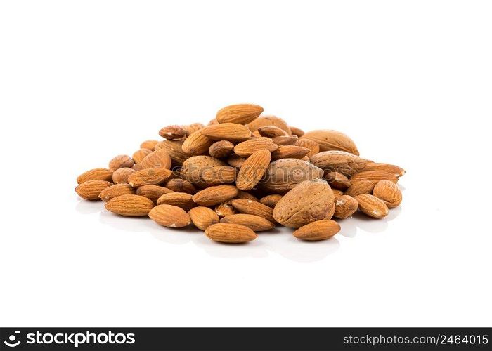 Pile of almonds nuts on a white background