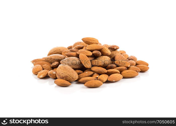 Pile of almonds nuts on a white background