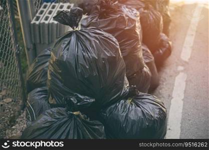 Pile of black Garbage bags. City waste management good hygiene.
