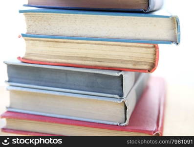 pile of books with colored covers