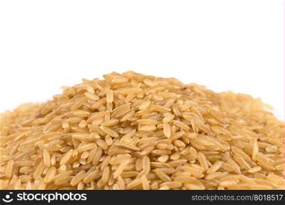 pile of brown rice isolated on white