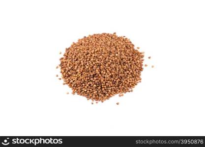 Pile of buckwheat seeds isolated over the white background