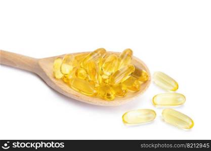 Pile of capsules Omega 3 in wooden spoon isolated on white background. Softgels, tablets for skin, health, disease treatment. Health care, diet, heart cardiovascular support, skin care, pharmacy. Pile of softgels capsules Omega 3 in wooden spoon isolated on white background.