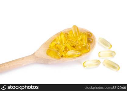 Pile of capsules Omega 3 in wooden spoon isolated on white background. Softgels, tablets for skin, health, disease treatment. Health care, diet, heart cardiovascular support, skin care, pharmacy. Pile of softgels capsules Omega 3 in wooden spoon isolated on white background.