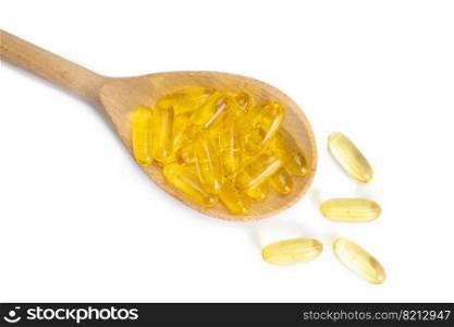 Pile of capsules Omega 3 in wooden spoon isolated on white background. Softgels, tablets for skin, health, disease treatment. Health care, diet, heart cardiovascular support, skin care, pharmacy