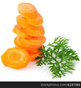 Pile of carrot slices and green parsley leaves closeup on white reflective background.