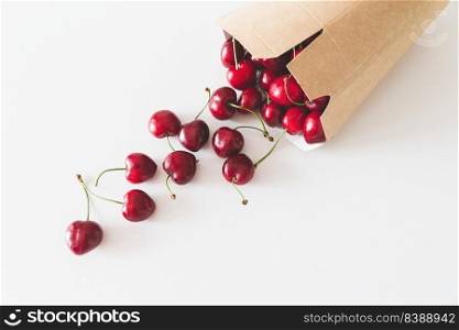 Pile of cherries on white wooden table. Soft focus