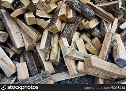 Pile of chopped fire wood. Stack of firewood
