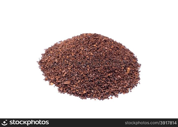 Pile of coarsely crushed coffee beans isolated on white background