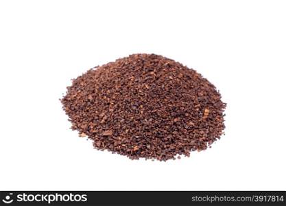 Pile of coarsely crushed coffee beans isolated on white background