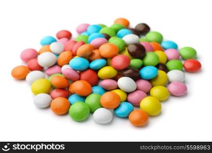 Pile of colorful candy drops isolated on white
