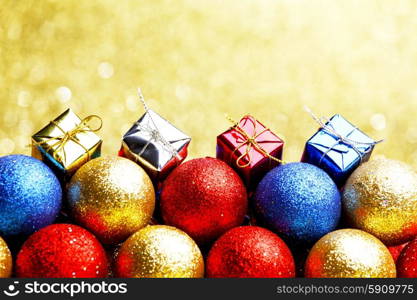 Pile of colorful Christmas balls with blurred background
