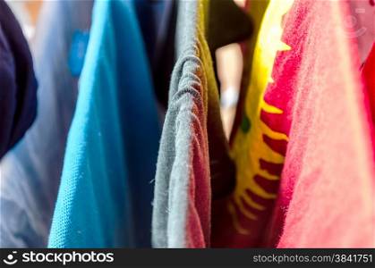 Pile of colorful laundry clothes close up