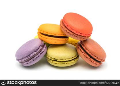Pile of colorful sweet macarons on white background