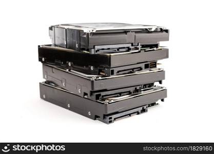 Pile of computer Hard disk drive HDD isolated on white background. Computer hardware data storage