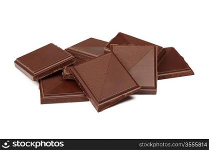 Pile of dark chocolate isolated on white
