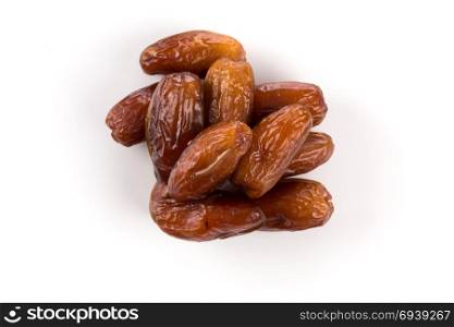 pile of dates fruits isolated on a white background