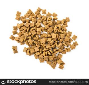 Pile of dry dog food isolated on white background, seen from directly above.