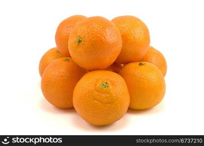 pile of fresh tangerines on white background