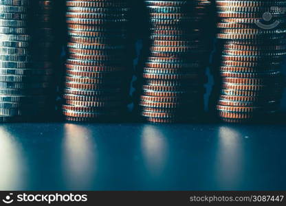 Pile of gold coins money stack in finance treasury deposit bank account saving . Concept of corporate business economy and financial growth by investment in valuable asset to gain cash revenue .. Pile of gold coins money stack in finance treasury deposit bank account saving