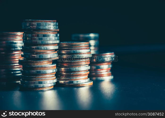 Pile of gold coins money stack in finance treasury deposit bank account saving . Concept of corporate business economy and financial growth by investment in valuable asset to gain cash revenue .. Pile of gold coins money stack in finance treasury deposit bank account saving