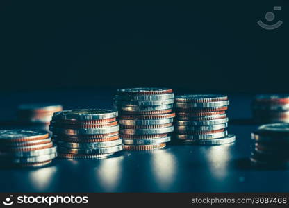 Pile of gold coins money stack in finance treasury deposit bank account saving . Concept of corporate business economy and financial growth by investment in valuable asset to gain cash revenue .. Pile of gold coins money stack in finance treasury deposit bank account saving