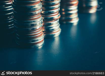 Pile of gold coins stack in finance treasury deposit bank account for saving . Concept of corporate business economy and financial growth by investment in valuable asset to gain cash revenue profit .. Pile of gold coins stack in finance treasury deposit bank account for saving