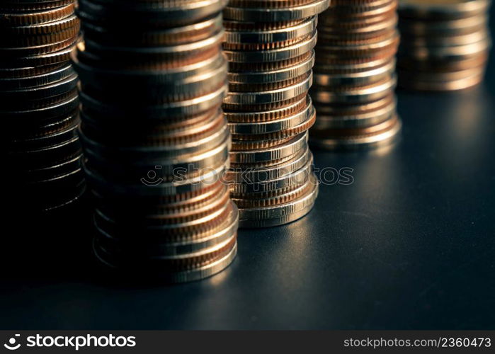 Pile of gold coins stack in finance treasury deposit bank account for saving . Concept of corporate business economy and financial growth by investment in valuable asset to gain cash revenue profit .. Pile of gold coins stack in finance treasury deposit bank account for saving