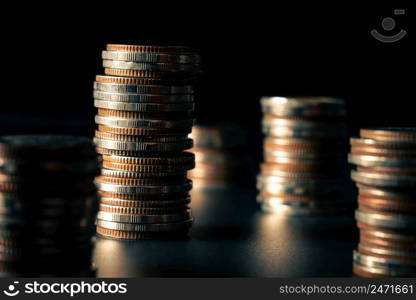 Pile of gold coins stack in finance treasury deposit bank account for saving . Concept of corporate business economy and financial growth by investment in valuable asset to gain cash revenue profit .. Pile of gold coins stack in finance treasury deposit bank account for saving