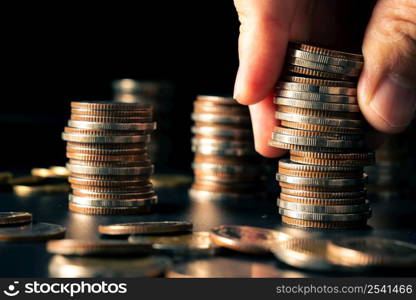 Pile of gold coins stack in finance treasury deposit bank account for saving . Concept of corporate business economy and financial growth by investment in valuable asset to gain cash revenue profit .. Pile of gold coins stack in finance treasury deposit bank account for saving