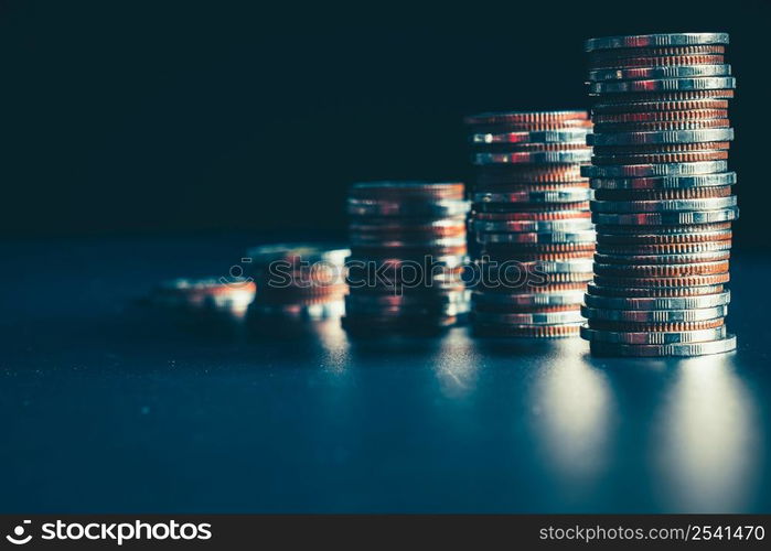 Pile of gold coins stack in finance treasury deposit bank account for saving . Concept of corporate business economy and financial growth by investment in valuable asset to gain cash revenue profit .. Pile of gold coins stack in finance treasury deposit bank account for saving