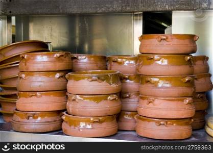 pile of many old pots for cooking