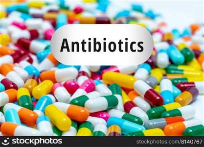 Pile of multi-colored antibiotics capsule pills. Antibiotic drug resistance concept. Prescription drugs. Superbug concept. Antibiotic drug use with reasonable. Pharmacology of antimicrobial drugs.