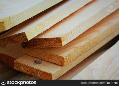 Pile of new wooden boards at construction site .. Pile of new wooden boards at construction site