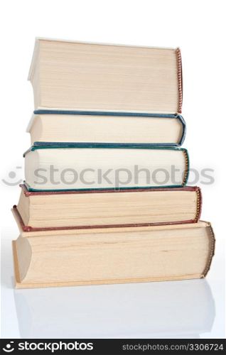 pile of old books isolated on white background