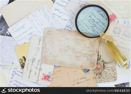 pile of old letters and antiques  vintage background with copy space