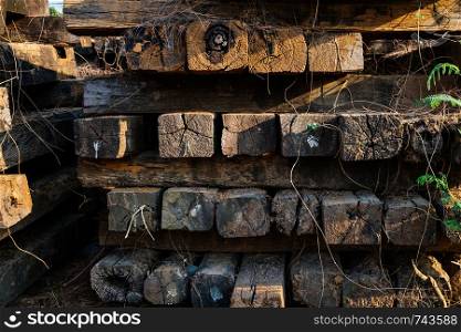Pile of old wooden railway sleepers.
