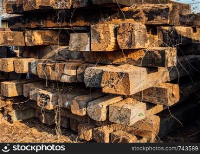 Pile of old wooden railway sleepers.