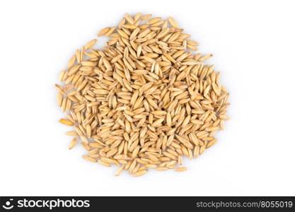 pile of organic oat grains isolated on white background