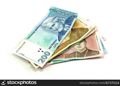 pile of paper banknotes isolated on white background