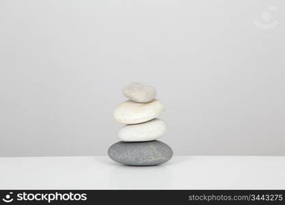 Pile of pebbles set on table