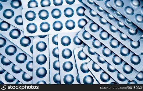 Pile of pills blister pack. Pharmaceutical industry. Prescription drugs. Pharmacy banner. Drug production. World health day background. Healthcare and medicine. Tablet and capsule pills manufacturing.