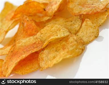 Pile of potato chips, close up shot